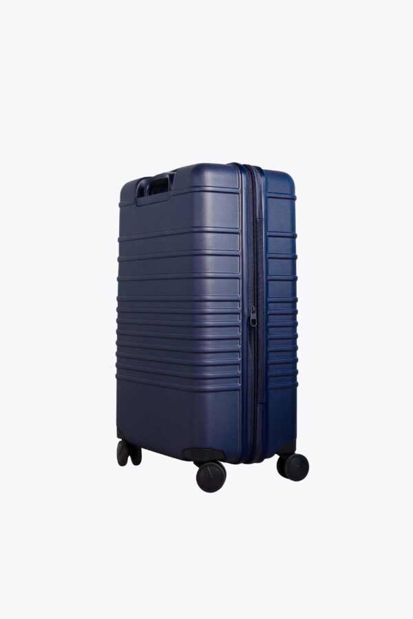 The Medium Check-In Roller in Navy