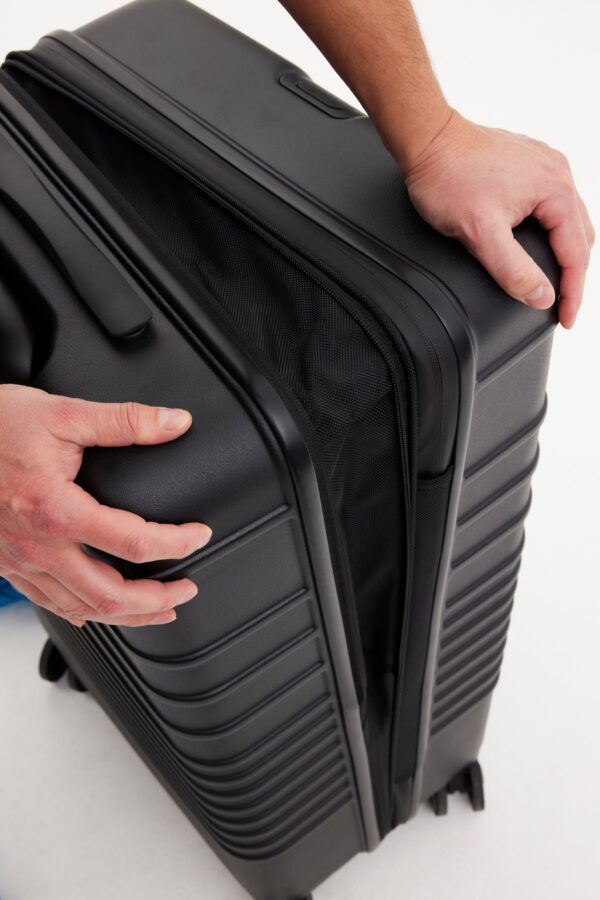 The Medium Check-In Roller in All Black