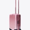 The Small Carry-On Roller in Wicked Pink