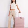 The Large Check-In Roller in Atlas Pink