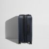 The Bigger Carry-On Flex in Navy Blue