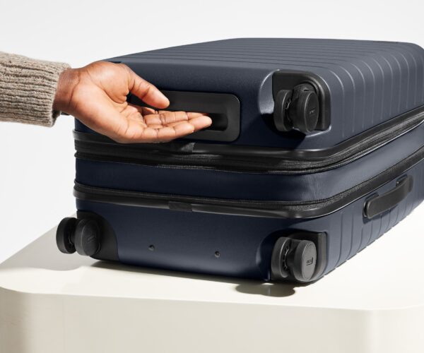 The Bigger Carry-On Flex in Navy Blue